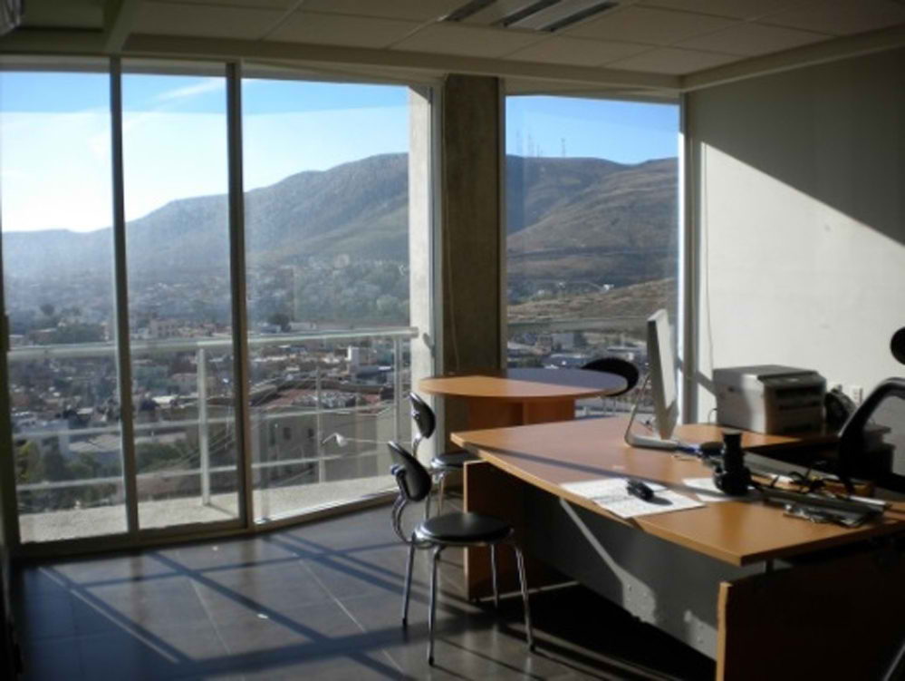 Interior view of the private office located in building B2 (winter solstice at 10h00 LT).